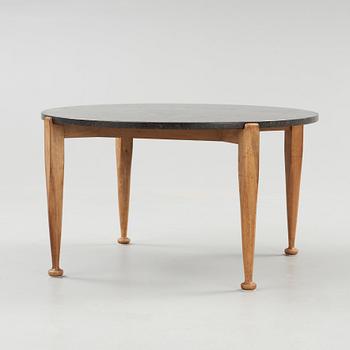 A Josef Frank black marble top table, walnut based, Svenskt Tenn, model 960.