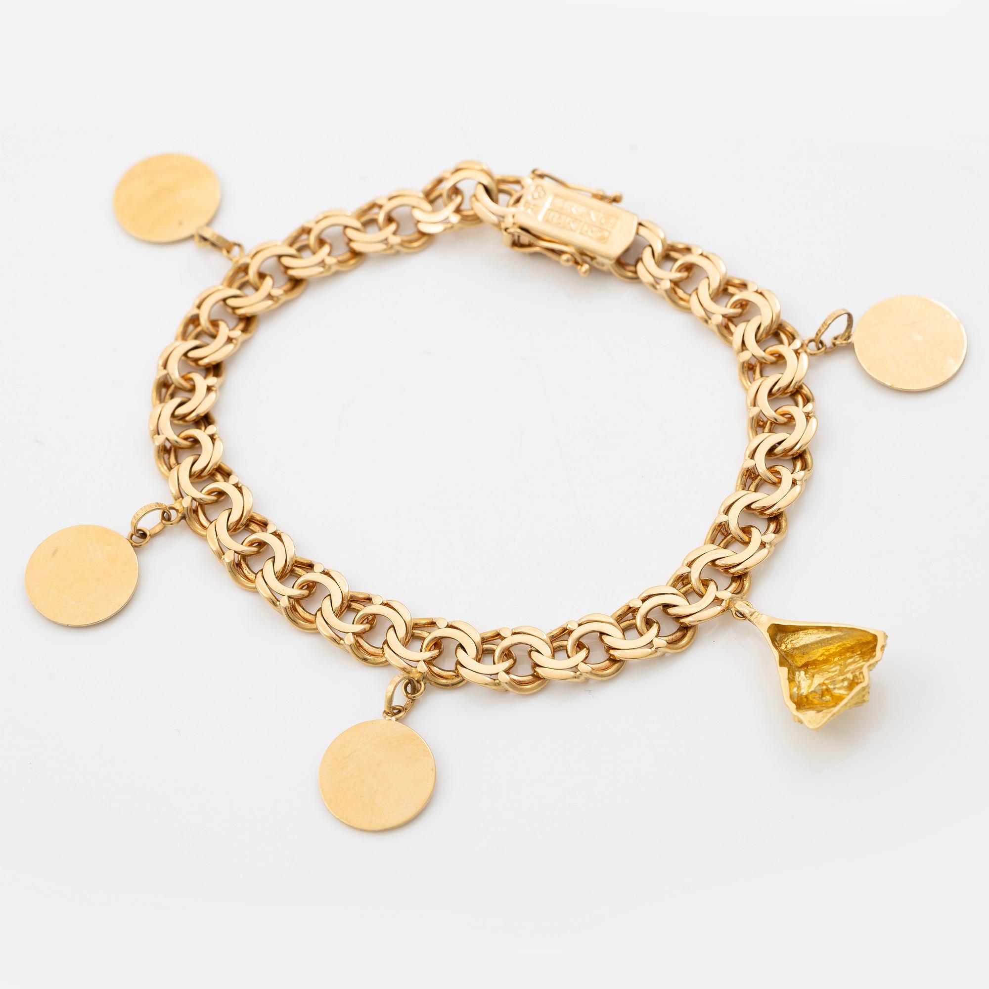 Bracelet, 18K gold, with charms including zodiac signs.