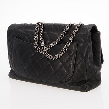 CHANEL Caviar Reissue 2.55 Jumbo Single Flap Bag.
