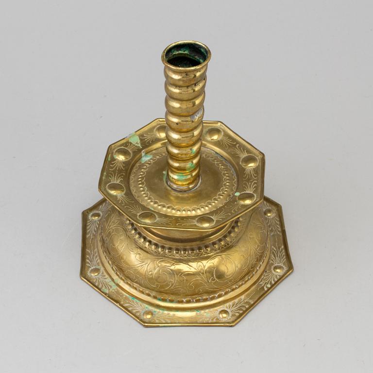 A 18th century Baroque brass candlestick.