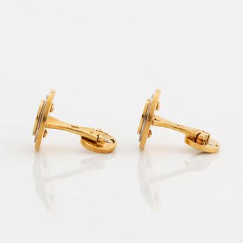 A pair of 18K gold cufflinks M Gérard.