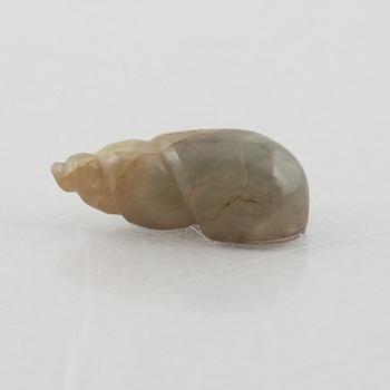 A group of three Chinese stone charms, 20th century.