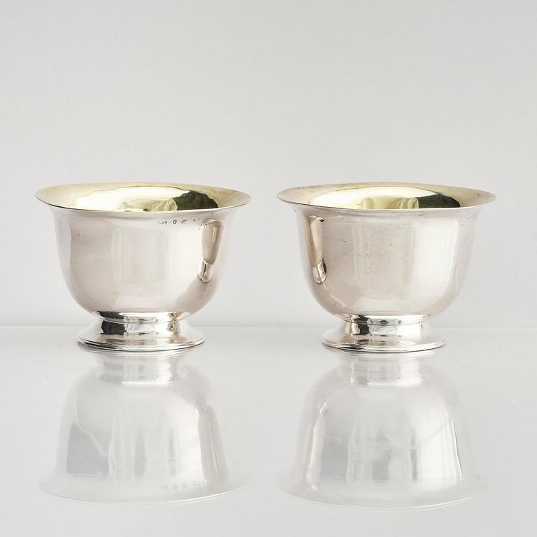 A pair of Swedish parcel-gilt silver dessert bowls with stand, mark of Gustaf Möllenborg, Stockholm 1830.