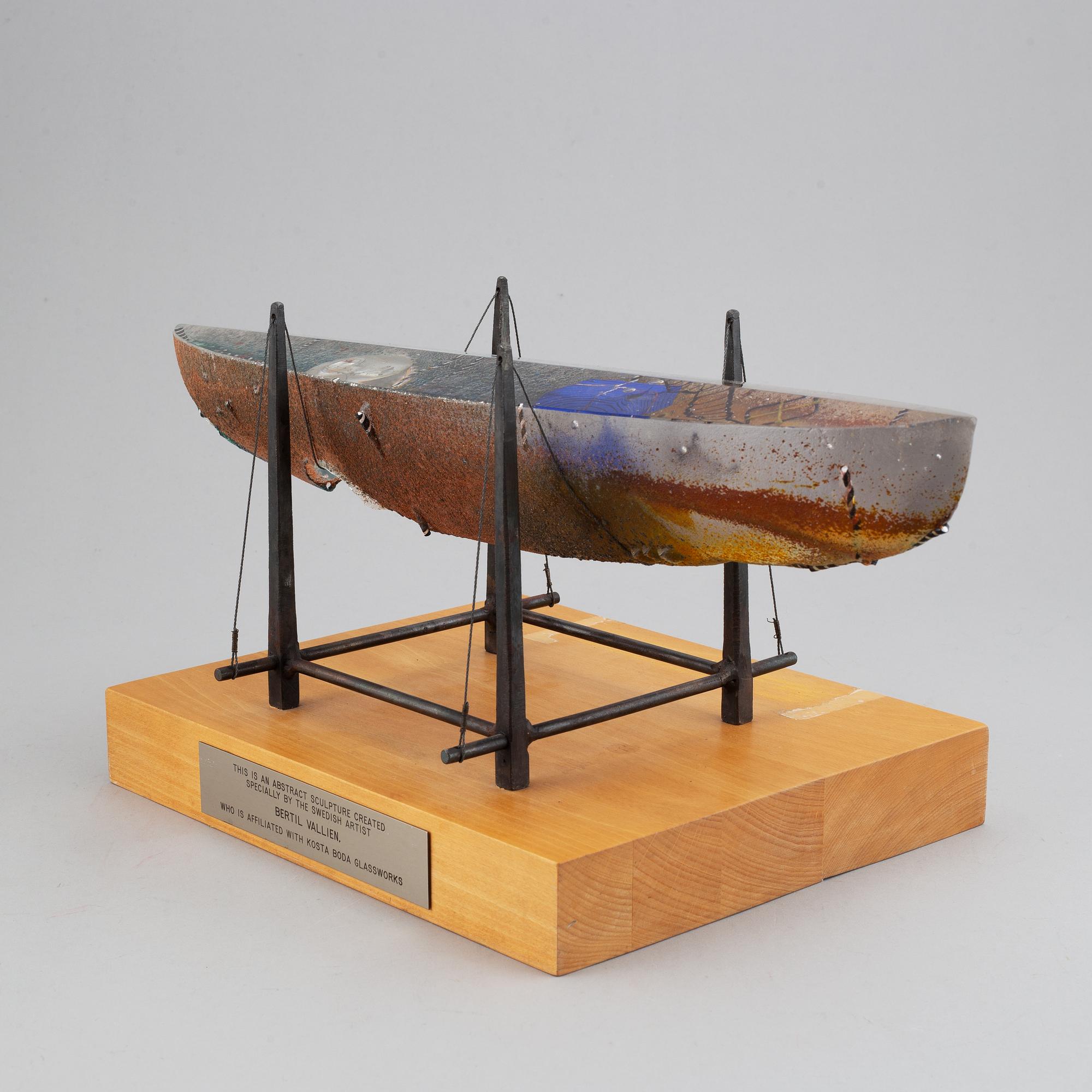 Bertil Vallien, a sand cast glass sculpture of a boat, Kosta Boda, Sweden.