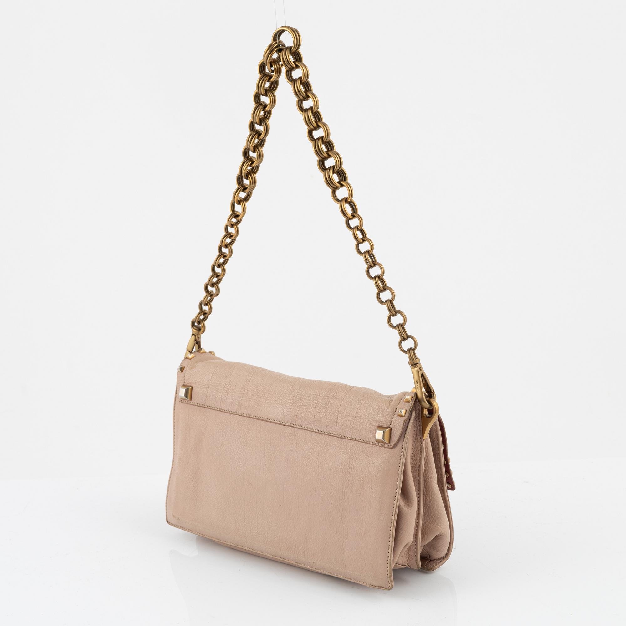 Prada, a pink leather and tassle bag.