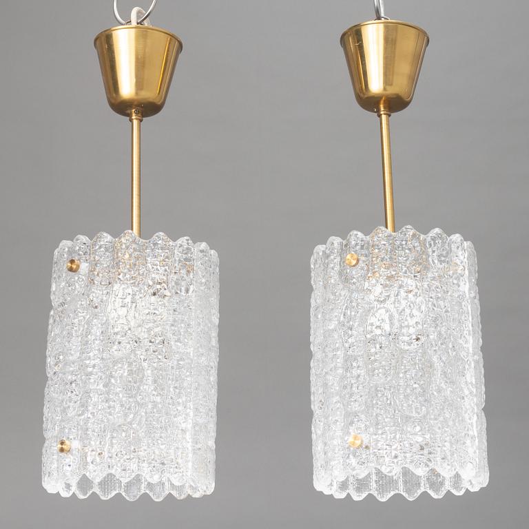 Carl Fagerlund, a pair of ceiling lamps, Orrefors, second half of the 20th Century.