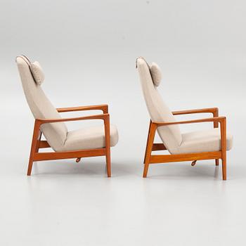 Folke Ohlsson, a pair of "Duxiesta" armchairs with an ottoman, Dux, Sweden, 1960's.