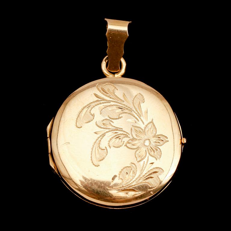 MEDALJONG, 18 k guld. Total vikt ca 9 g.