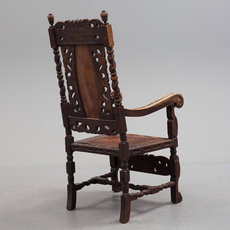 A 19th century baroque style armchair.