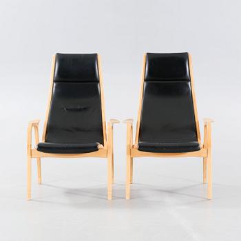 A pair of armchairs by Yngve Ekström for Swedese, second half of the 20th century.