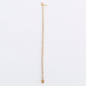 TENNISARMBAND 18K guld med 70 briljanter ca 3 ct totalt.