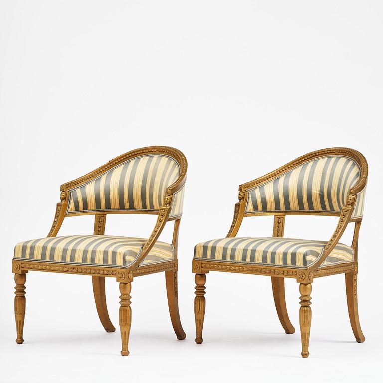 A pair of late Gustavian open armchairs attributed to E. Ståhl (master in Stockholm 1794-1820).
