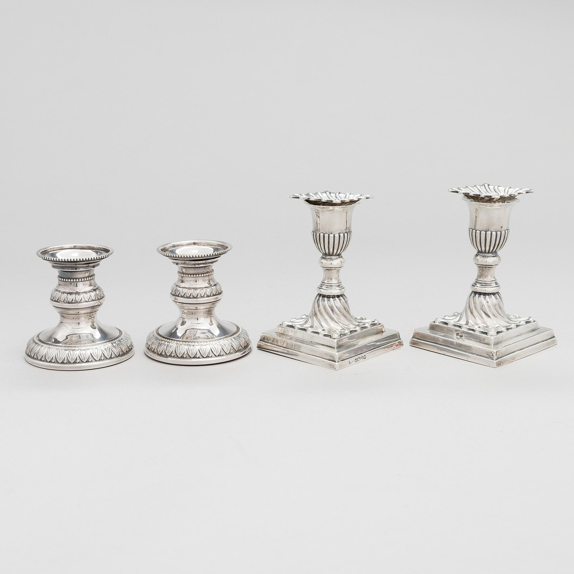 Two pairs of silver candlesticks, England 1889 and Finland 1975.
