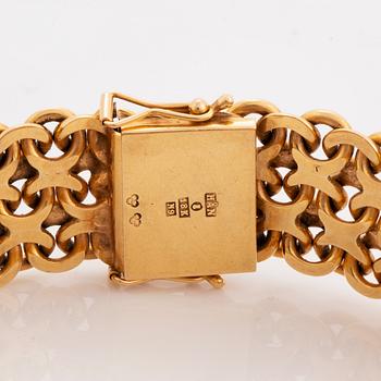 18K gold bracelet.