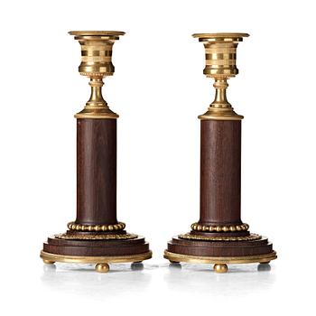 129. A pair of late Gustavian late 18th century candlesticks.