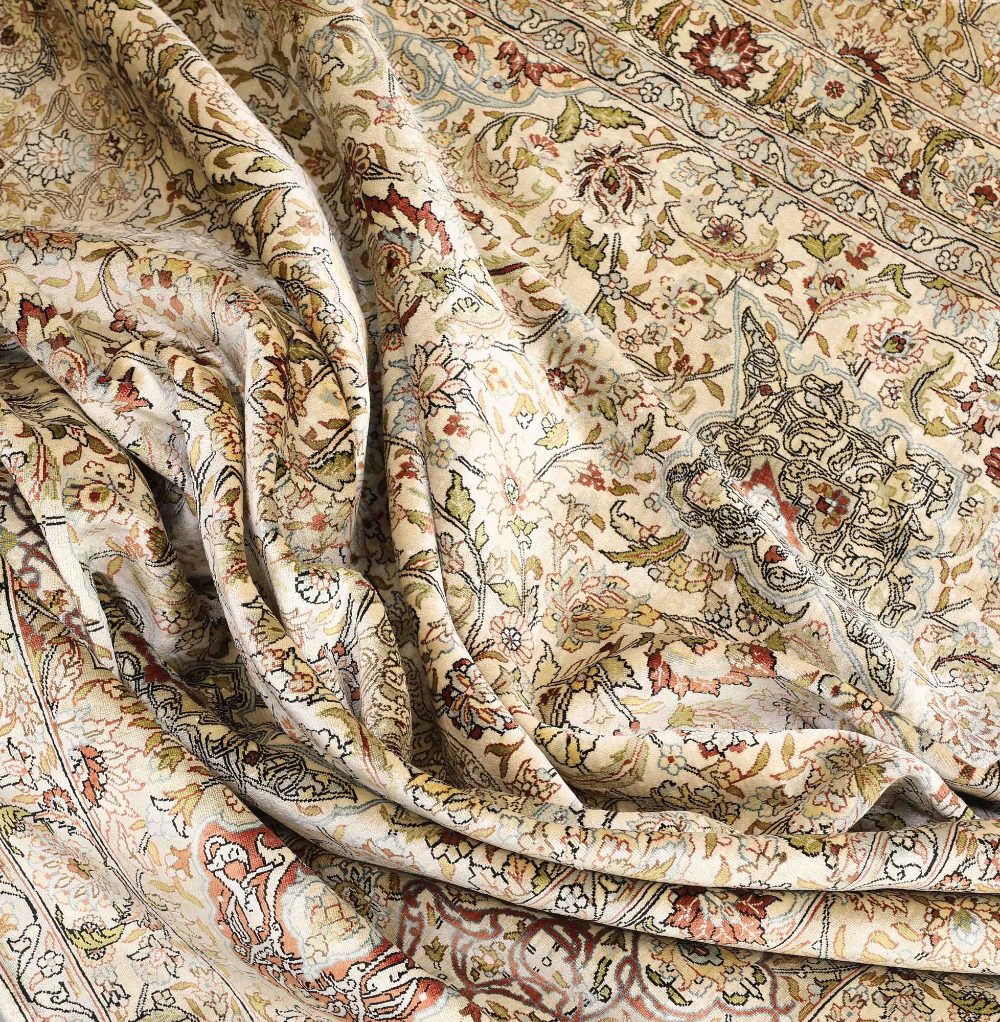 A oriental silk carpet, 350 x 247 cm.