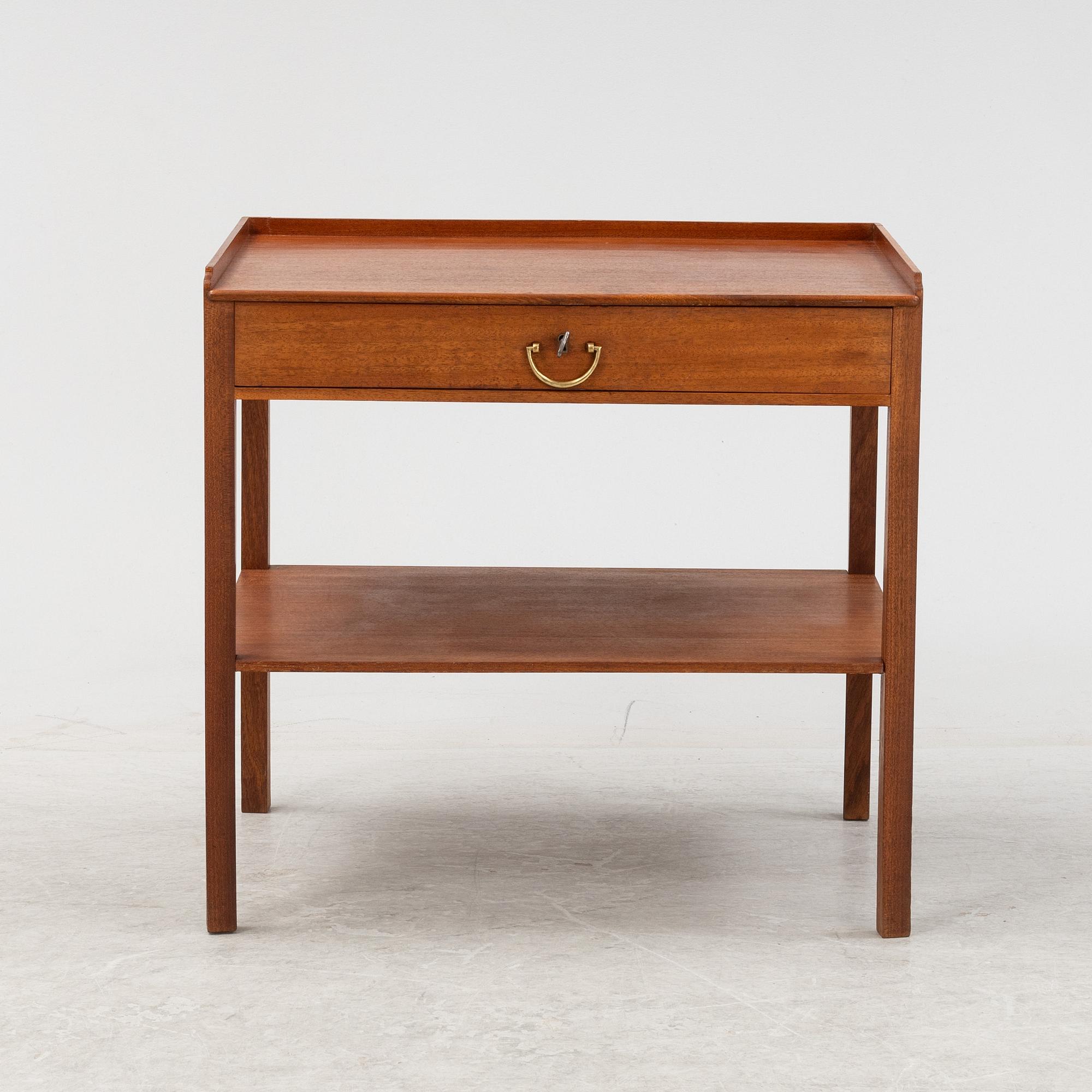 Josef Frank, a mahogany veneered side table, Firma Svenskt Tenn.