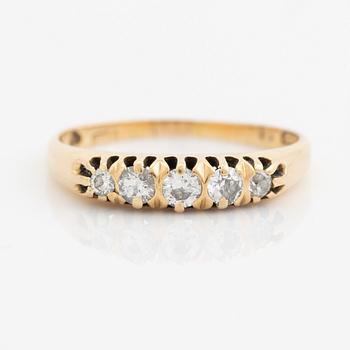 18K gold and brilliant cut diamond ring.