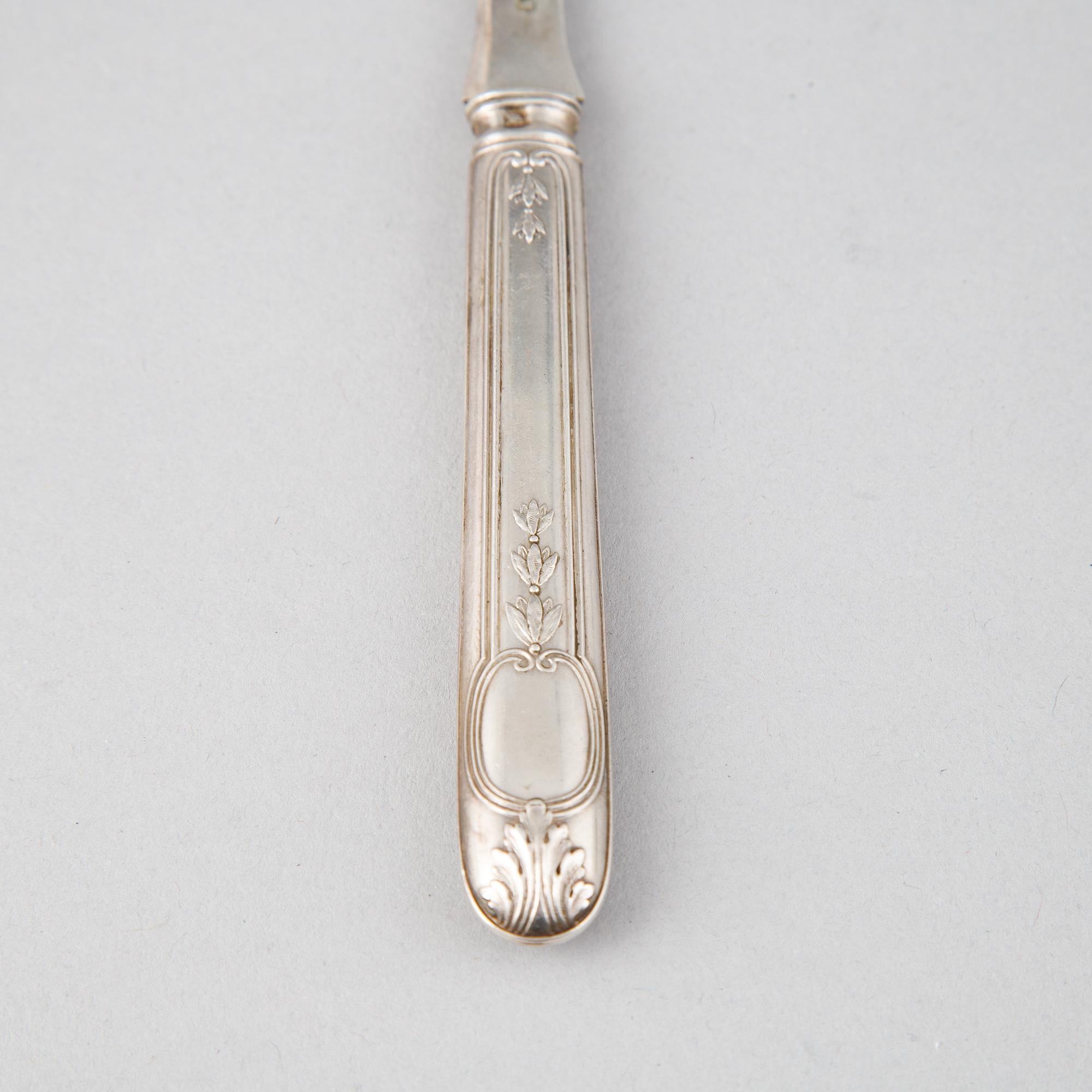 A set of twelve French 19th century silver lobster forks.