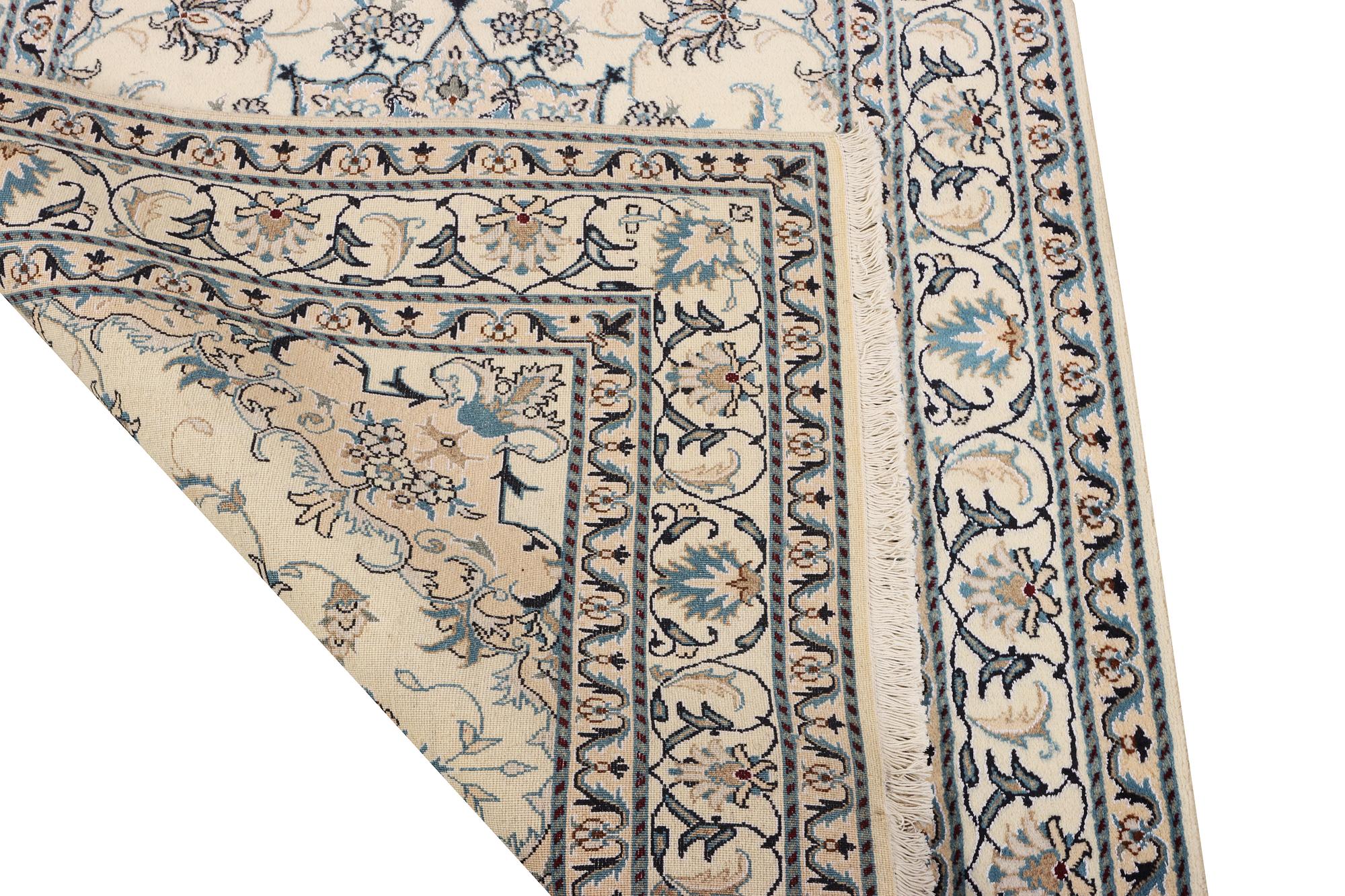 A Nain part silk rug, c. 193 x 148 cm.