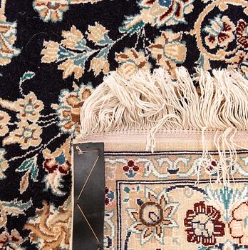 A Nain part silk carpet ca 212x133 cm.
