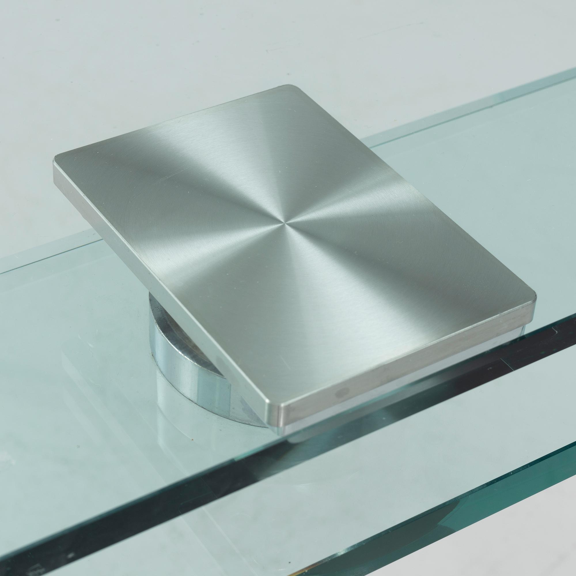 Studio Kronos, an 'Azimut' glass dining table, Cattelan Italia.