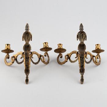 A 20th Century pair of Louis XVI style wall sconces, for two candles.