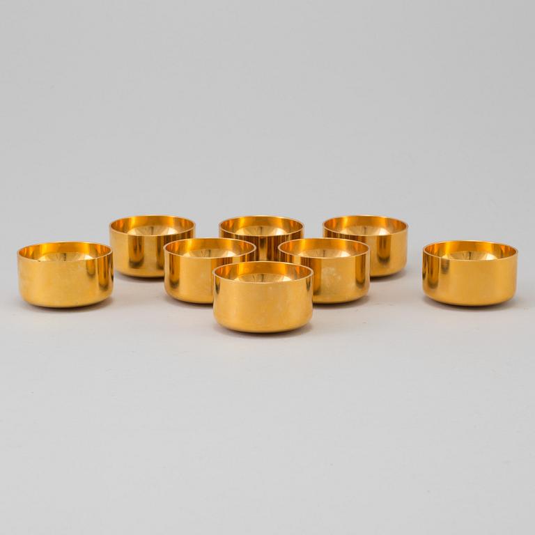 A set of eight brass drinking cups by PIERRE FORSSELL for Skultuna, Sweden.
