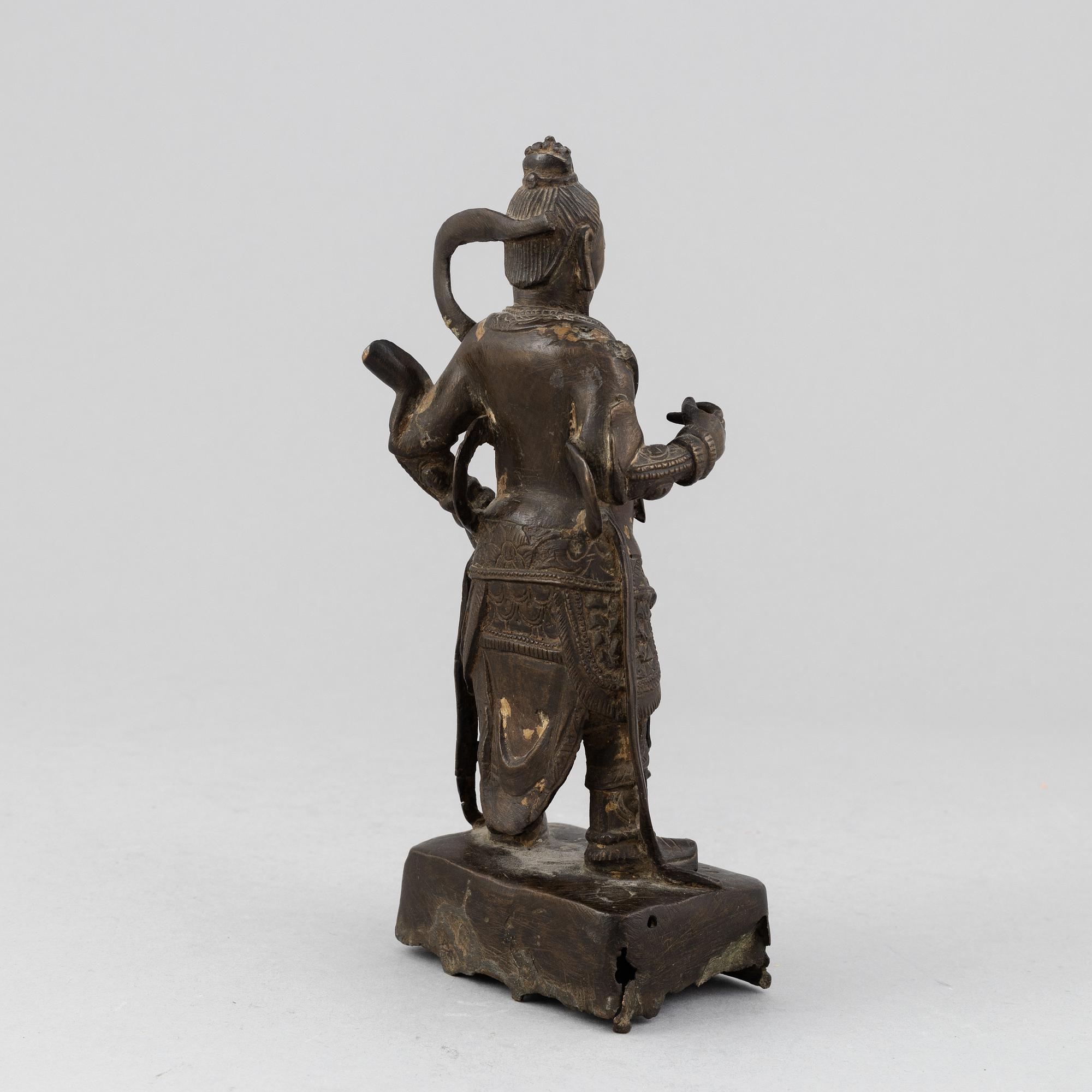 A bronze sculpture of a warrior, Qing dynasty.