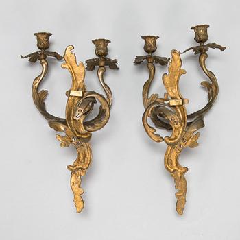 A pair of wall sconces, circa 1900.