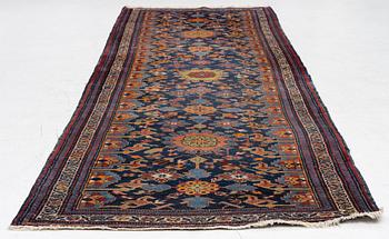 A north-west Persian, semi-antique runner, c. 340 x 110 cm.