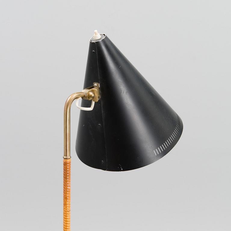 A mid-20th century standard lamp model K10-10 for Idman.
