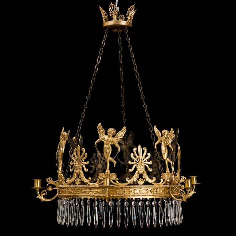 A first half of the 20th century EMpire style chandelier.