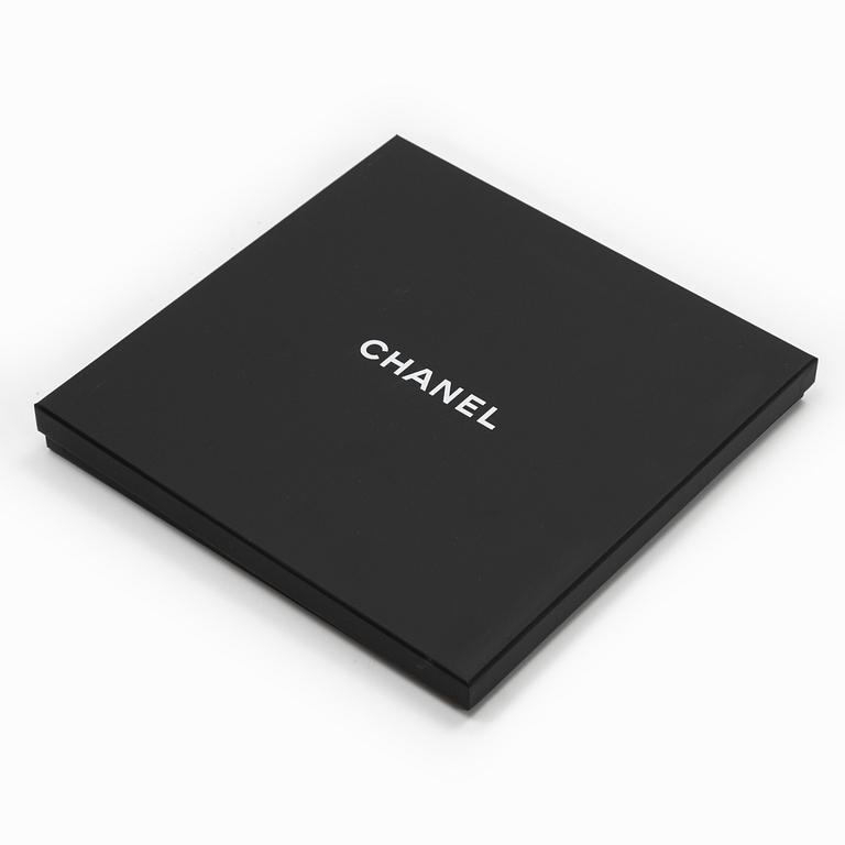 Chanel, a silk scarf.