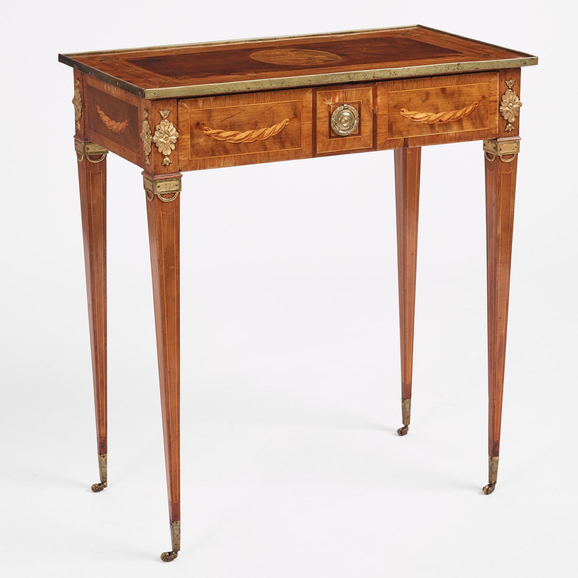 A Gustavian marquetry and gilt brass-mounted table by G. Iwersson (master in Stockholm 1778-1813).