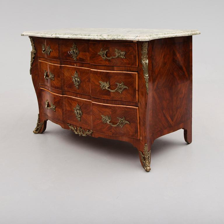A Swedish early Rococo mid 18th century commode attributed to Olof Martin, master 1736-1764.
