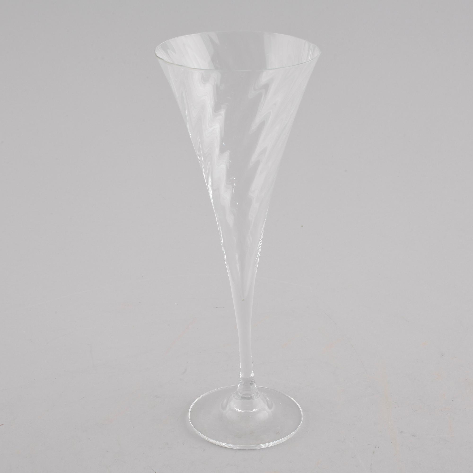 Twelve champagne glasses named "Heléna", designed by Gunnar Cyrén for Orrefors. Designed in 1977.
