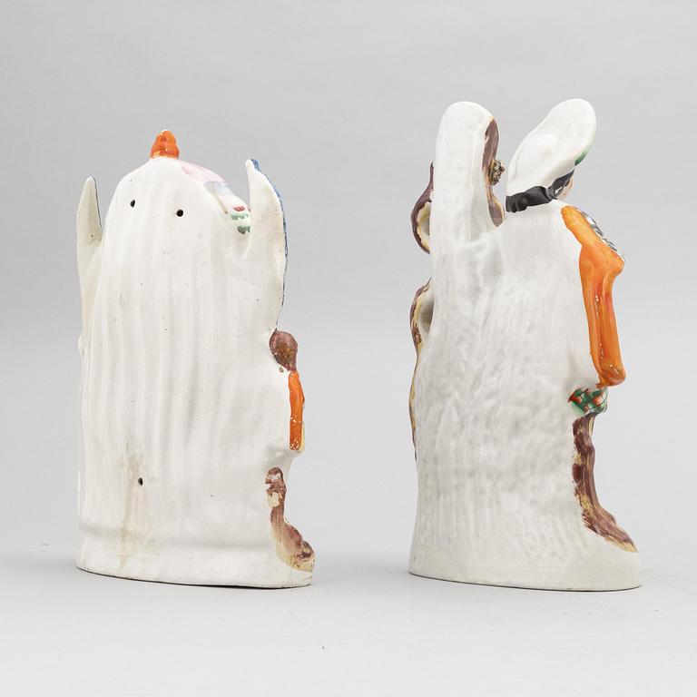 A set of eight English flintware figurines, 20th Century.
