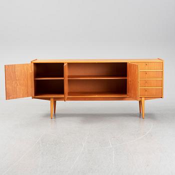 A second half of the 20th century teak veneered sideboard.