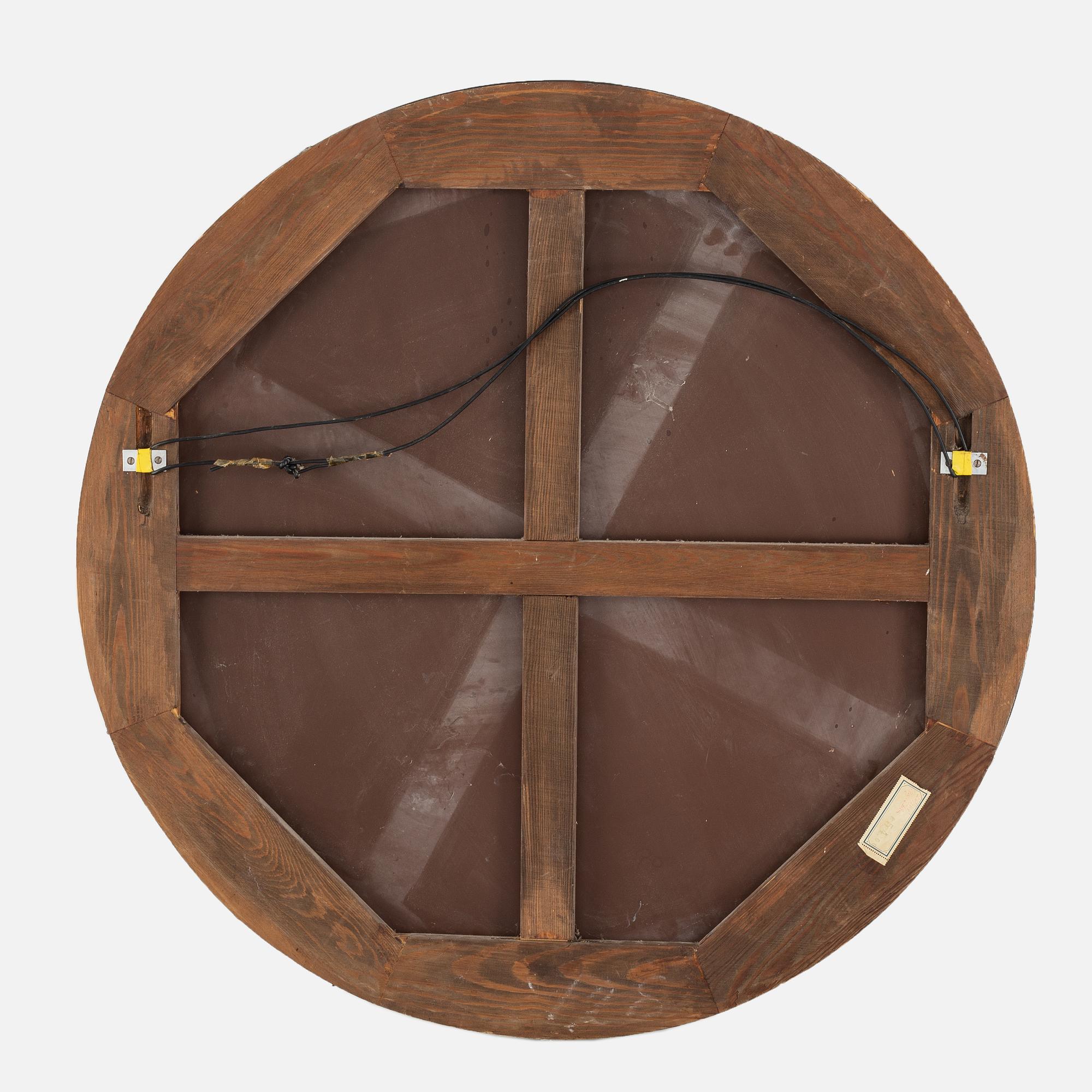 A round mirror. 1930's.