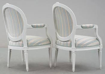A pair of Gustavian late 18th Century armchairs.