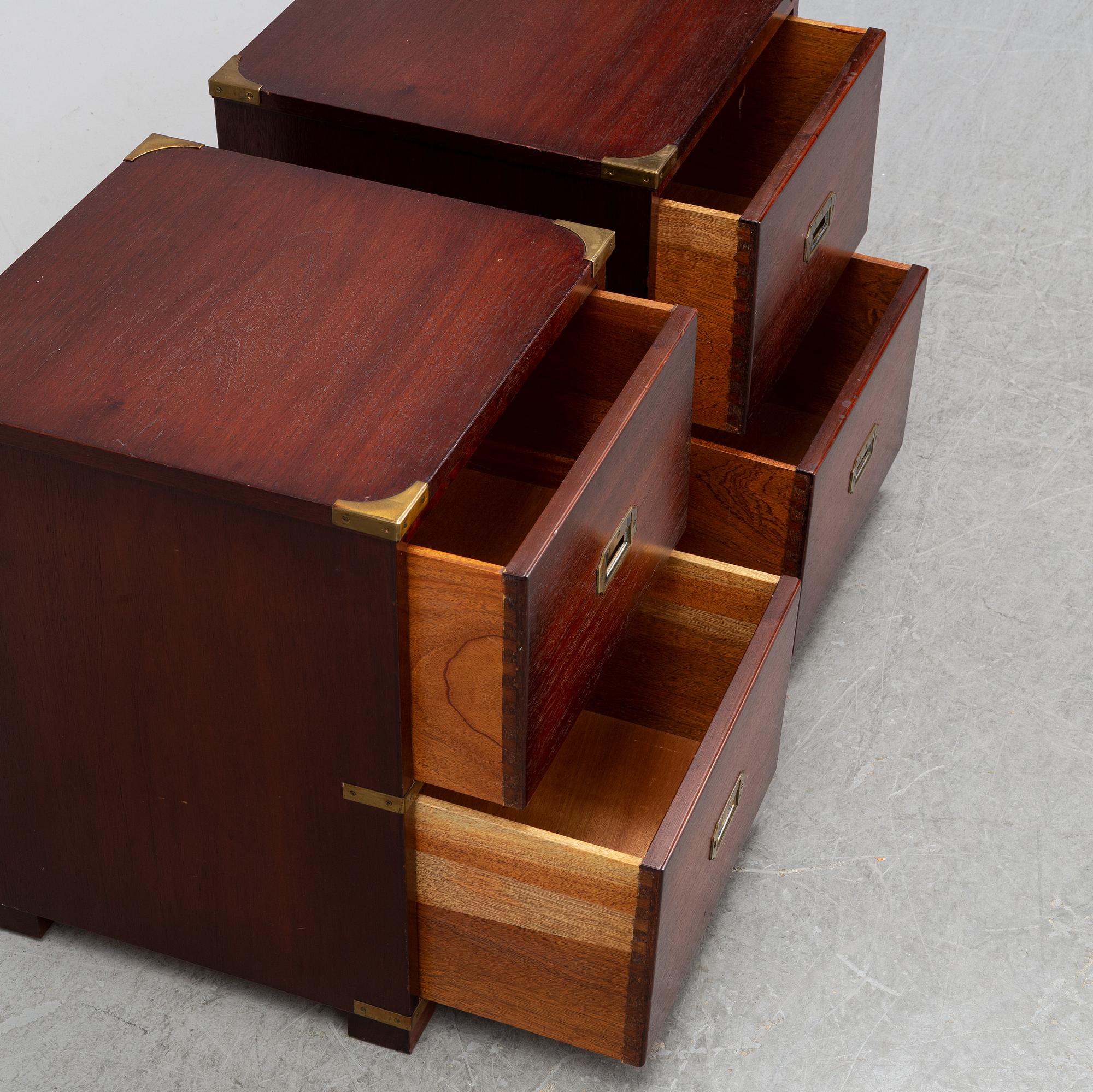 A pair of mahogany bedside tables, England second half of the 20th century.