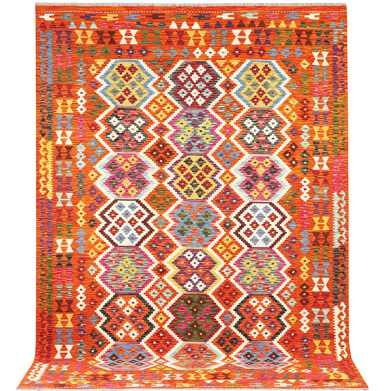 An Afghan kilim rug, c. 290 x 203 cm.