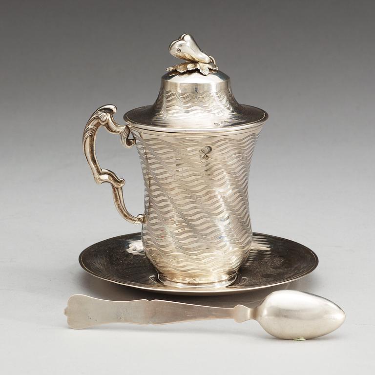 CHOCOLATE CUP with LID, SAUCER and SPOON. Silver, the inside gilt. Ottoman, Turkey late 19th century.