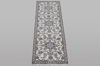 A runner carpet, Nain, part silk, ca 289 x 79 cm.