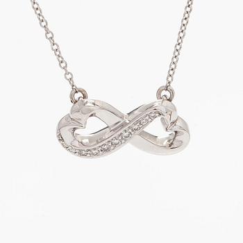 Tiffany & Co, Paloma Picasso, "Double Loving Heart" kaulakoru, 18K valkokultaa ja briljanttihiottuja timantteja.