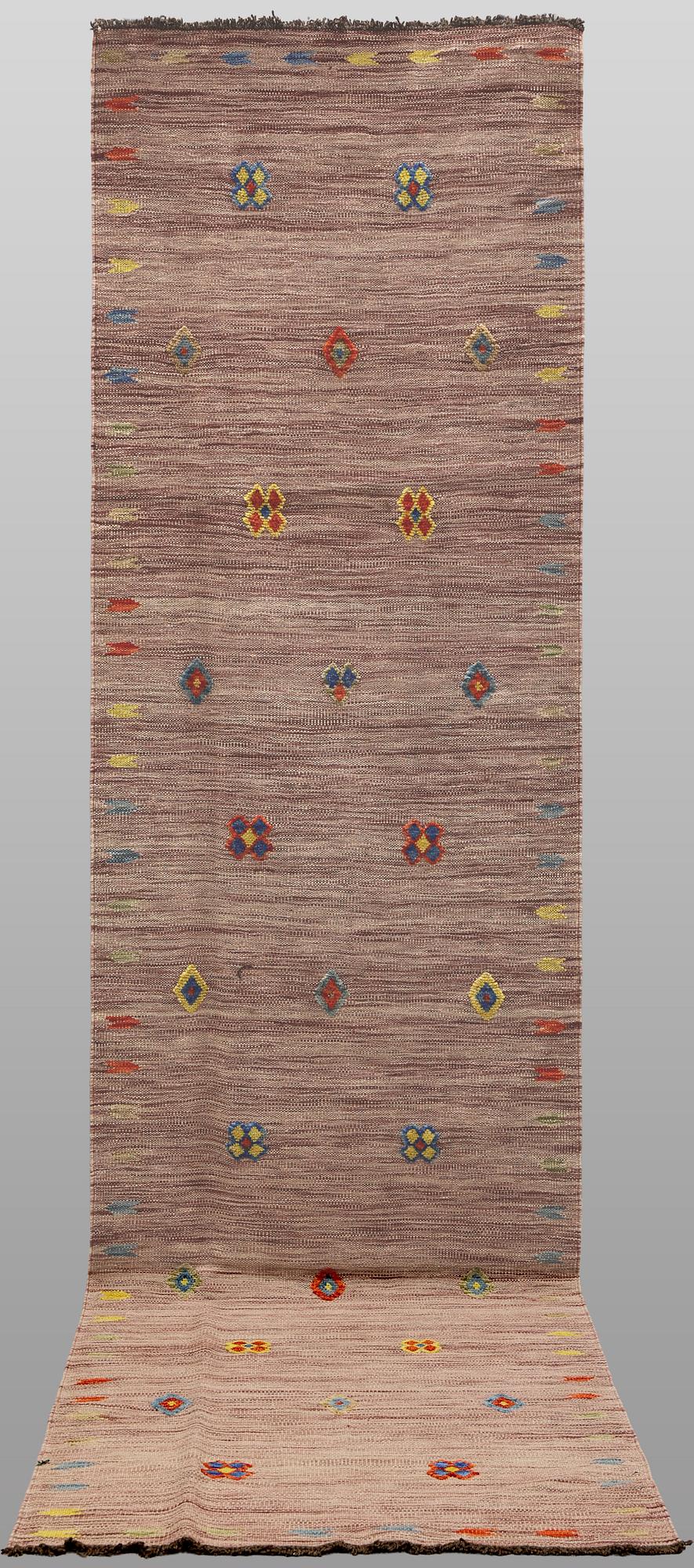 A Kelim runner carpet, 300 x 82 cm.