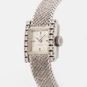 Omega, armbandsur, 18K vitguld med briljantslipade diamanter.