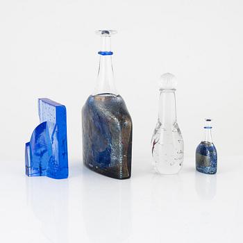 Bertil Vallien, four glass objects, Kosta Boda, Sweden, signed.