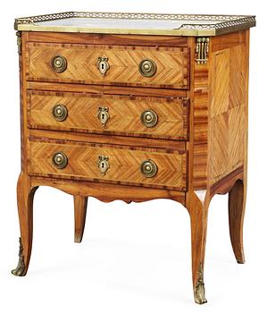 105. A Louis XVI-style commode.